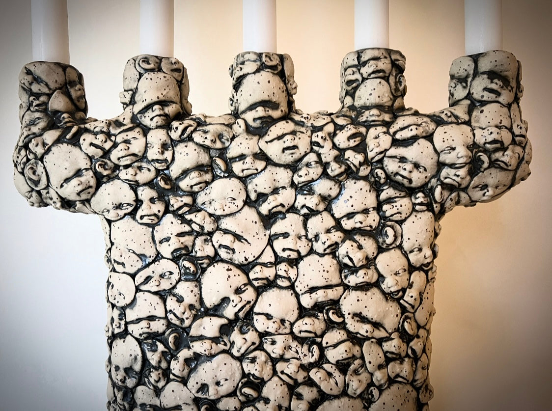 Kandelaber Små ansikten