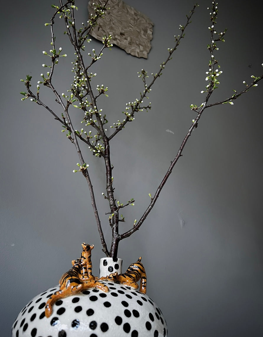 Ljusstake/Vas, Tigerungar