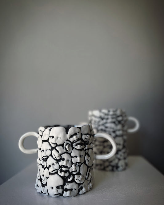 Kärl med öron, Ansikten