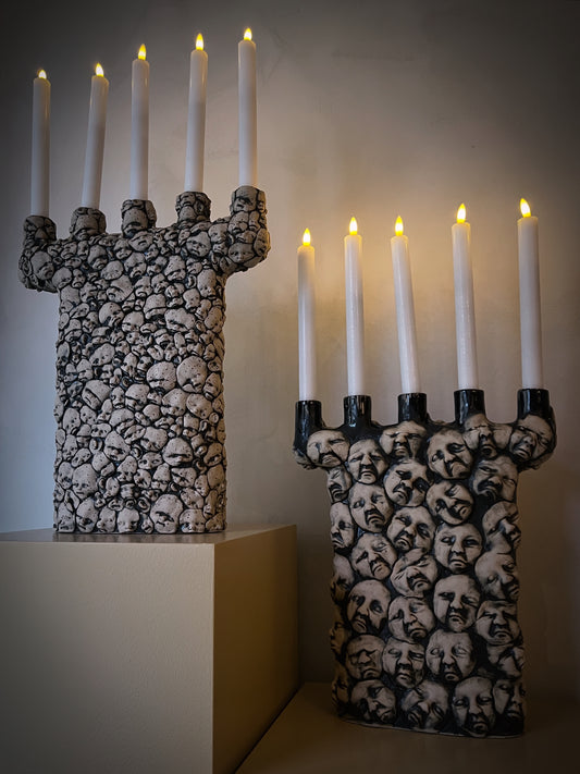 Kandelaber Små ansikten